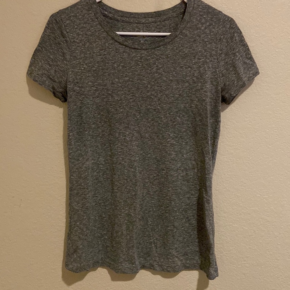 Plain T in good condition. Slightly worn